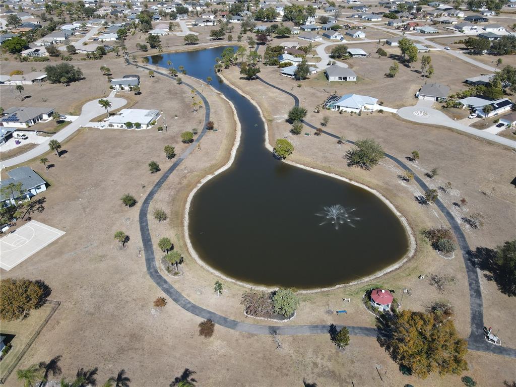 25554 Prada Drive Punta Gorda, FL 33955 - Photo 42 of 56 an aerial view of a swimming pool with outdoor seating