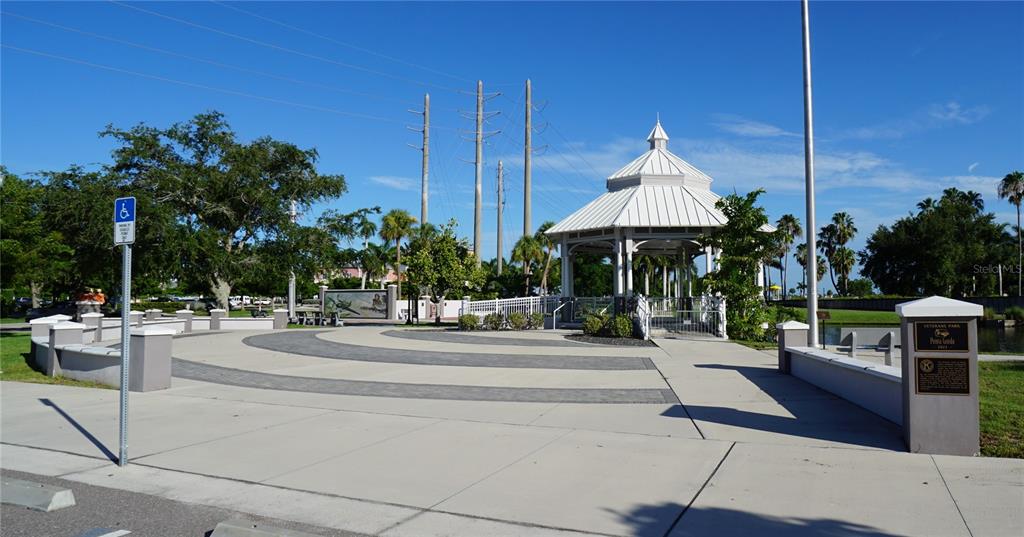 25554 Prada Drive Punta Gorda, FL 33955 - Photo 52 of 56 a view of a lobby with potted plants and palm trees