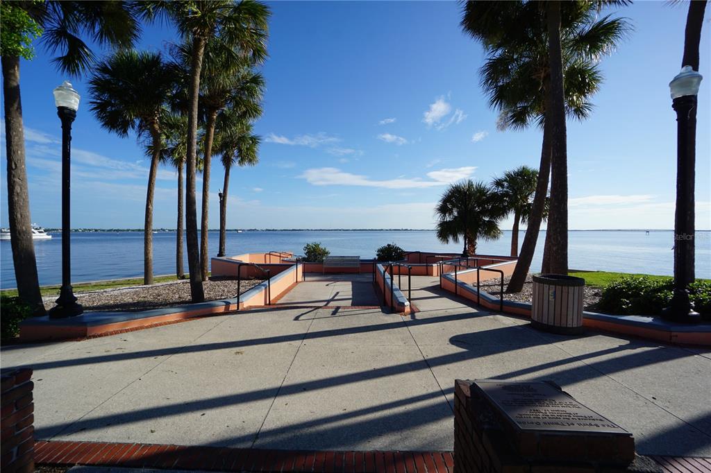25554 Prada Drive Punta Gorda, FL 33955 - Photo 53 of 56 a view of a roof deck with a palm tree