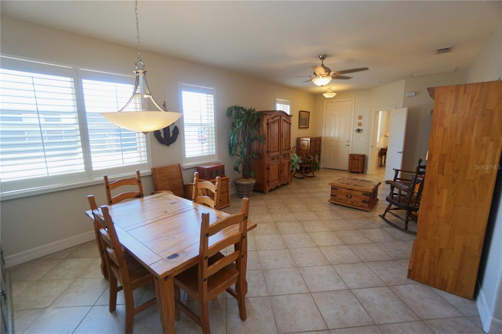 25554 Prada Drive Punta Gorda, FL 33955 - Photo 8 of 56 a view of a livingroom with furniture and a window