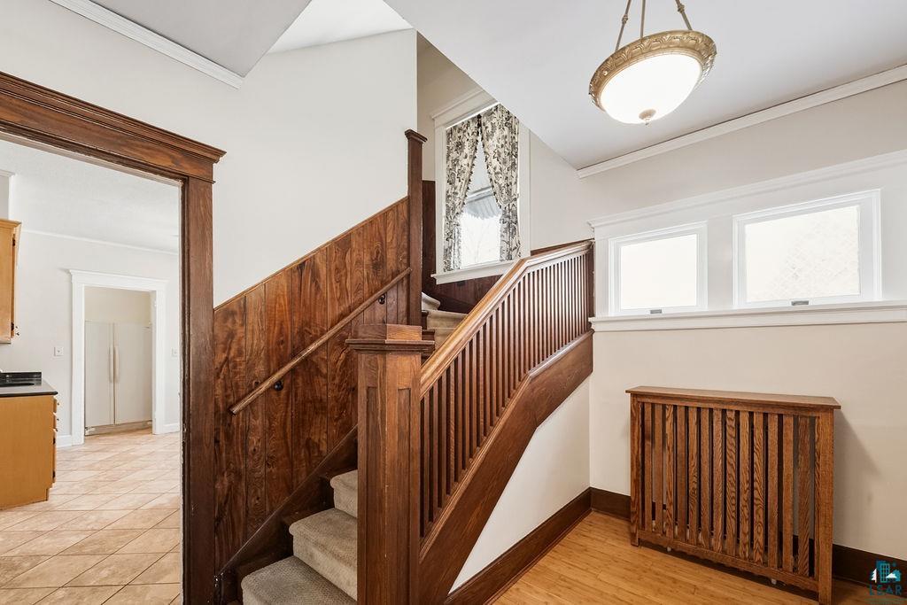 4220 McCulloch Street Duluth, MN 55804 - Photo 11 of 27 Stairway with crown molding and baseboards