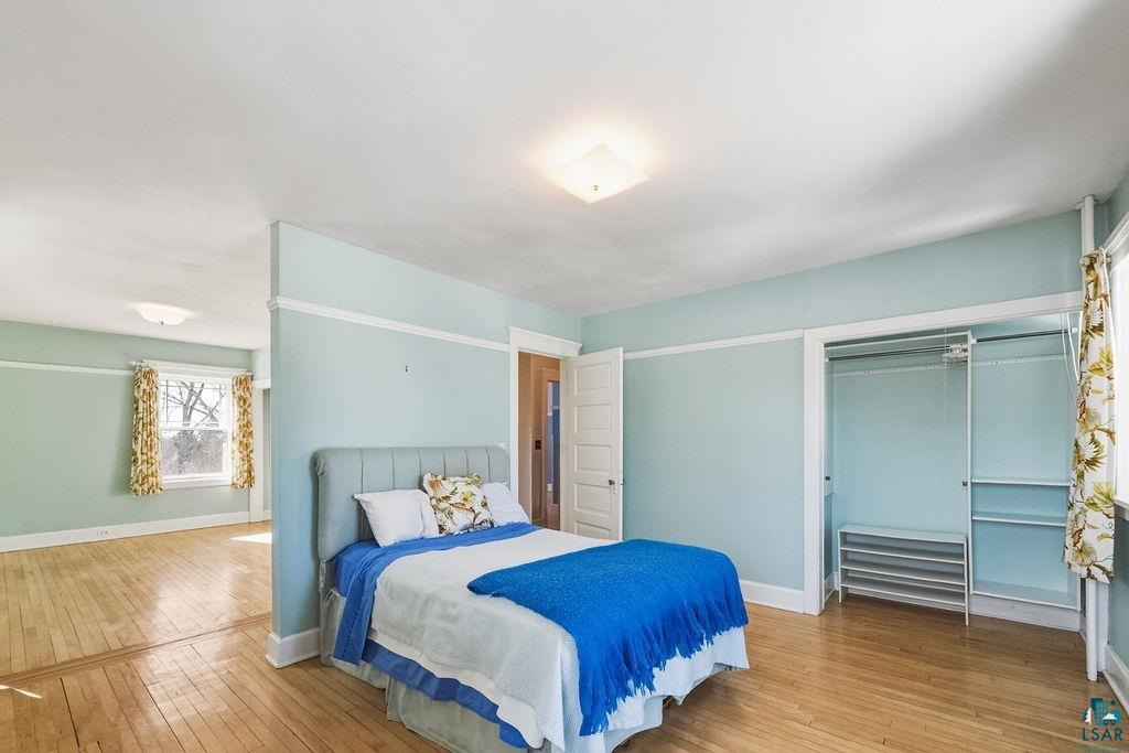 4220 McCulloch Street Duluth, MN 55804 - Photo 12 of 27 Bedroom with a closet and light wood-type flooring