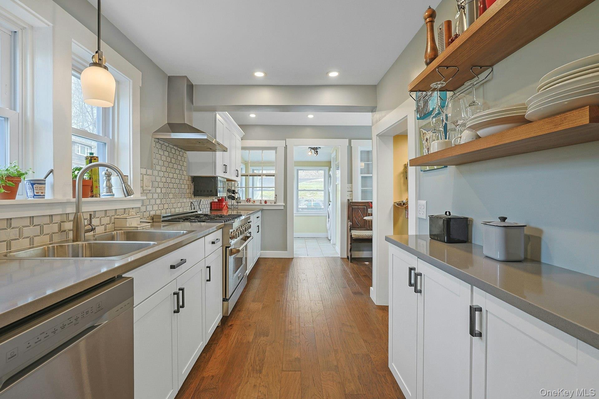56 North Greenbush Road West Nyack, NY 10994 - Photo 24 of 37 a large kitchen with stainless steel appliances granite countertop a lot of counter space and a sink