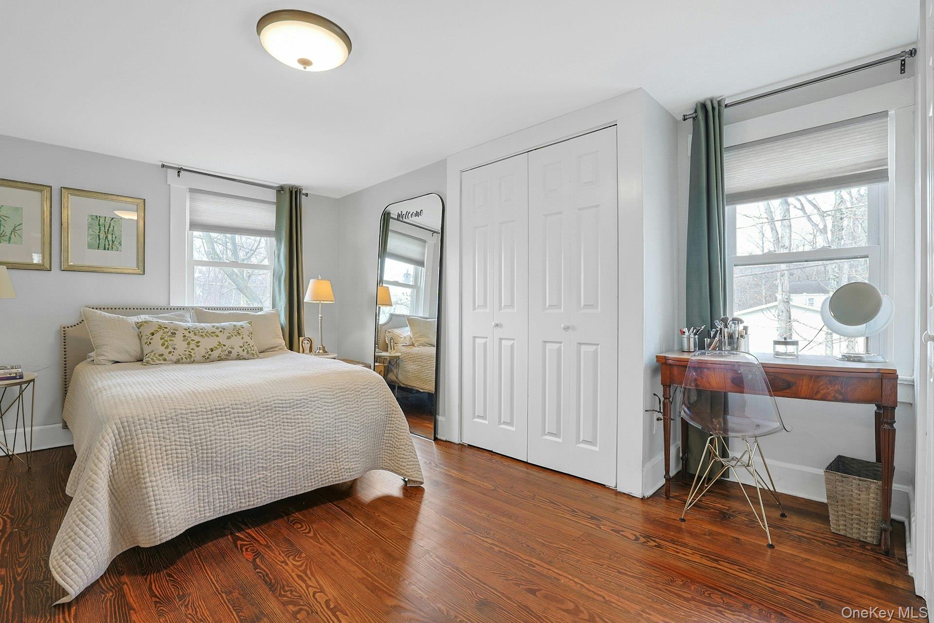 56 North Greenbush Road West Nyack, NY 10994 - Photo 32 of 37 a bedroom with a bed and wooden floor