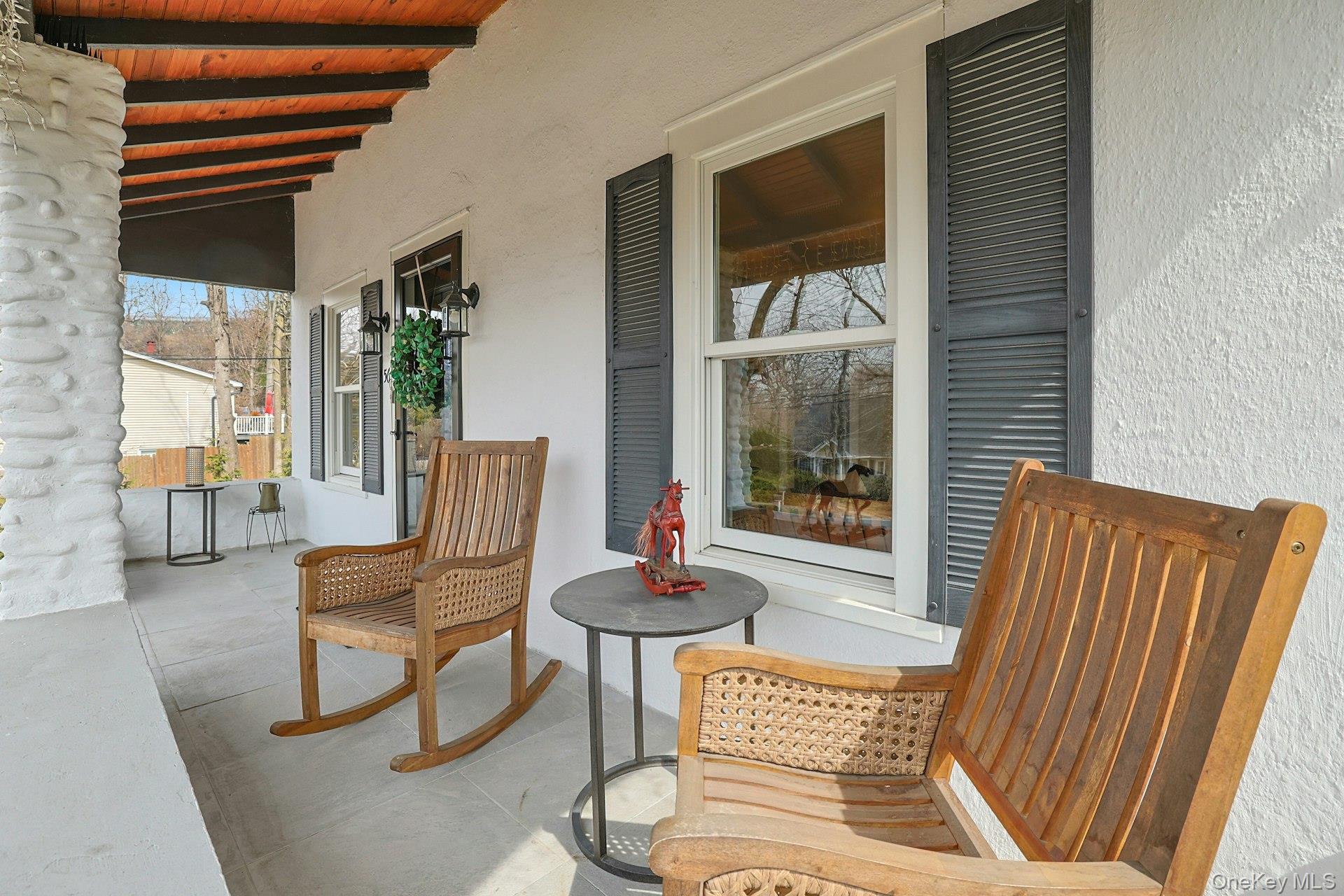 56 North Greenbush Road West Nyack, NY 10994 - Photo 6 of 37 a balcony with table and chairs