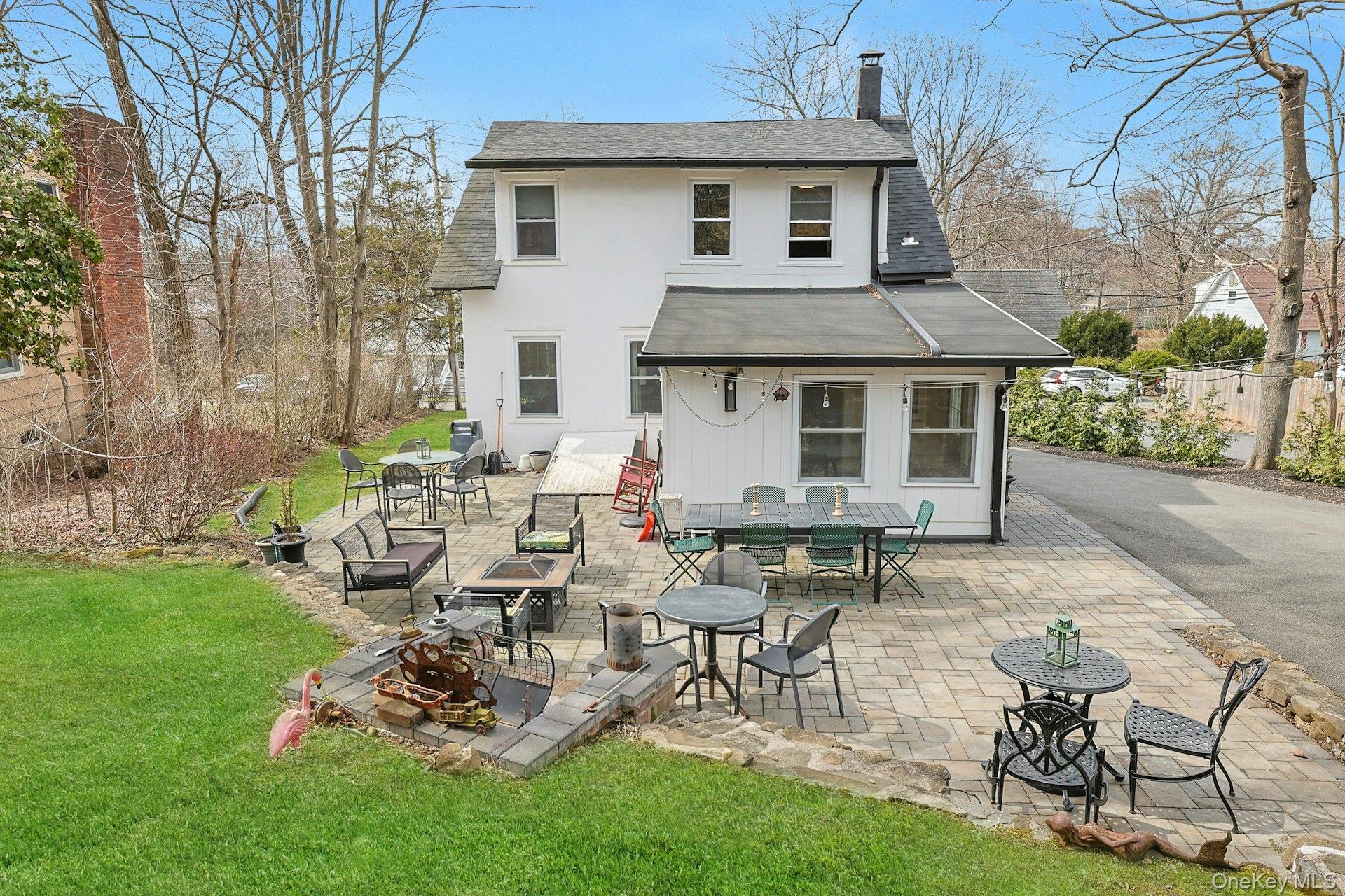 56 North Greenbush Road West Nyack, NY 10994 - Photo 10 of 37 a view of a patio with table and chairs and potted plants