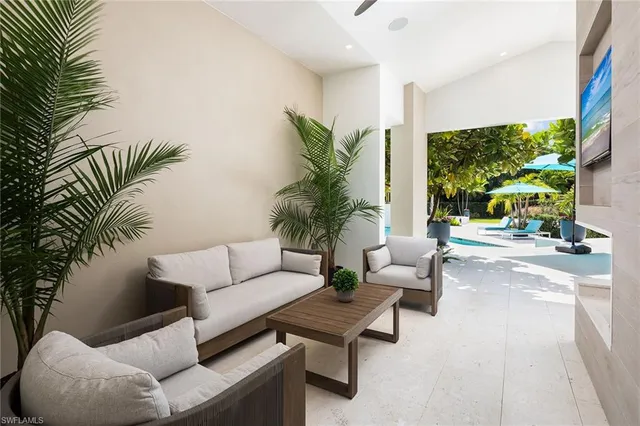 a view of a swimming pool with a patio