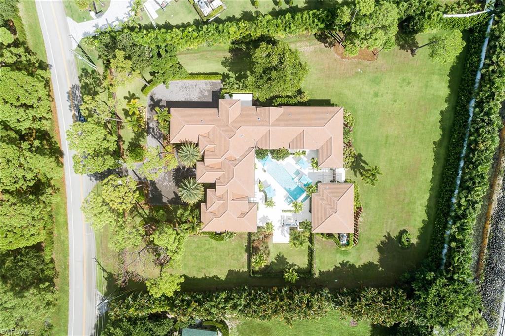 494 Gordonia Road Naples, FL 34108 - Photo 37 of 42 an aerial view of a residential houses with outdoor space