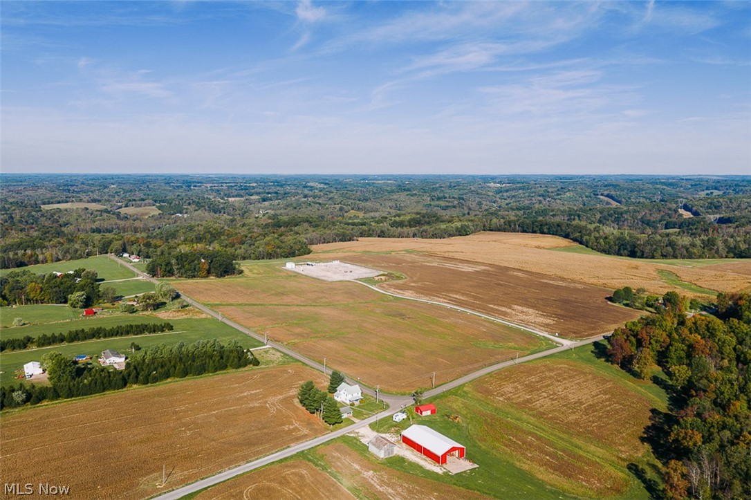 15 Glecoe Road Southwest Carrollton, OH 44615 - Photo 15 of 50 Aerial view of sparsely populated area featuring a heavily wooded area