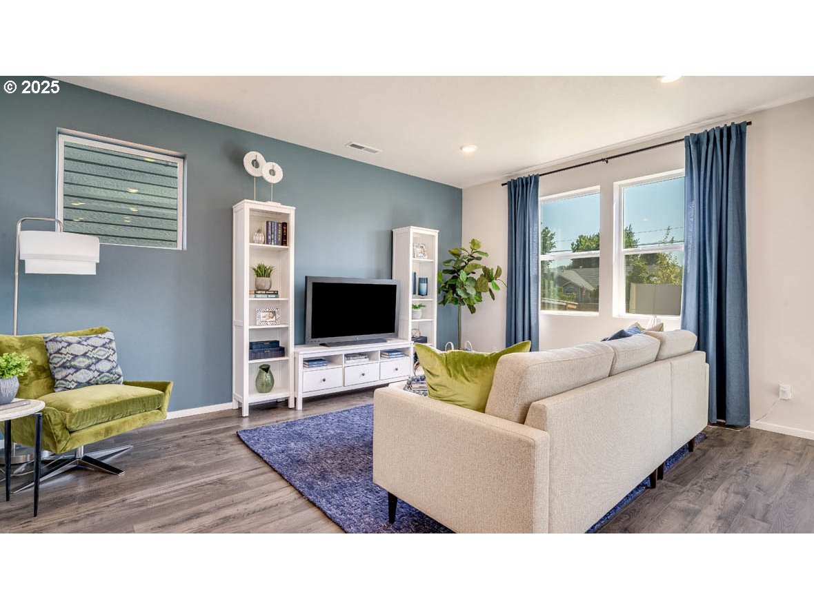 2971 T Street Springfield, OR 97477 - Photo 5 of 30 a living room with furniture and a flat screen tv