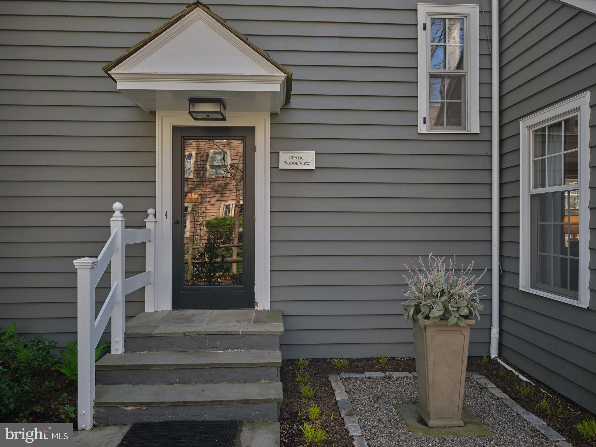 2976 River Road New Hope, PA 18938 - Photo 21 of 37 a front view of a house with a potted plant