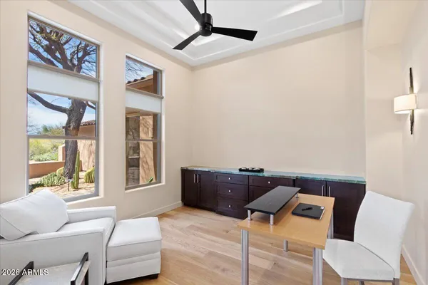 a living room with furniture and a window