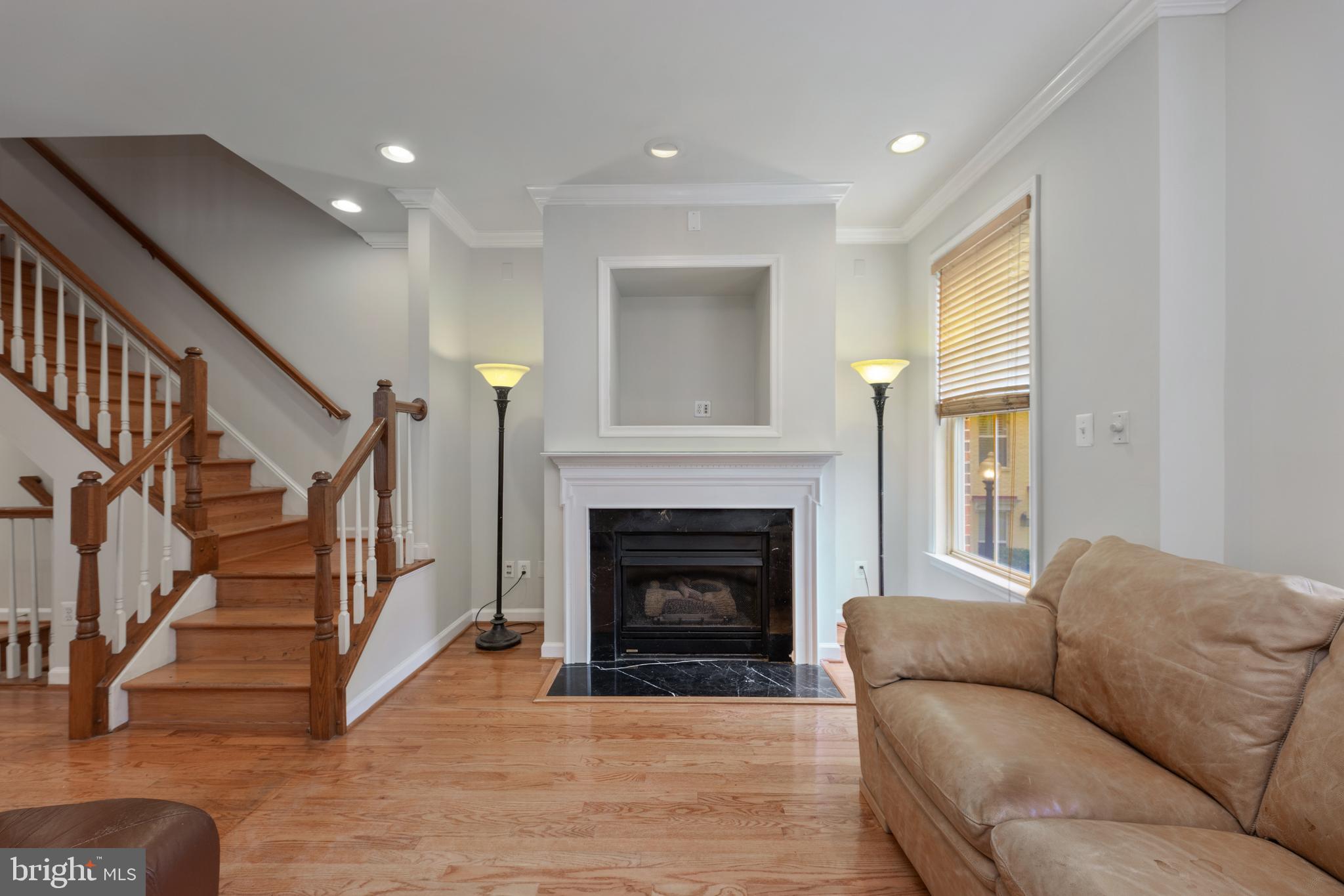 800 Capitol Square Place Southwest Washington, DC 20024 - Photo 21 of 52 a living room with furniture and a fireplace