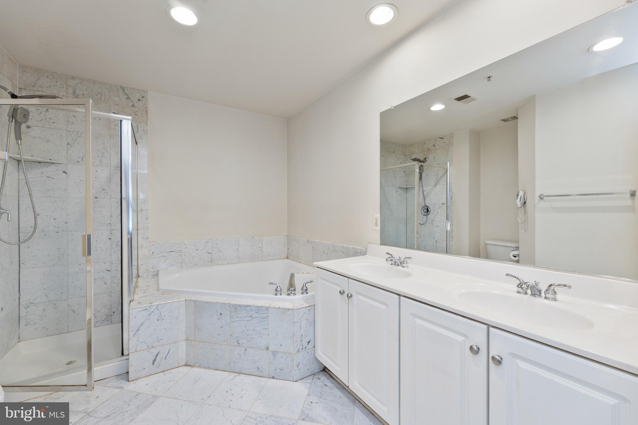 800 Capitol Square Place Southwest Washington, DC 20024 - Photo 27 of 52 a bathroom with a double vanity sink mirror and bathtub