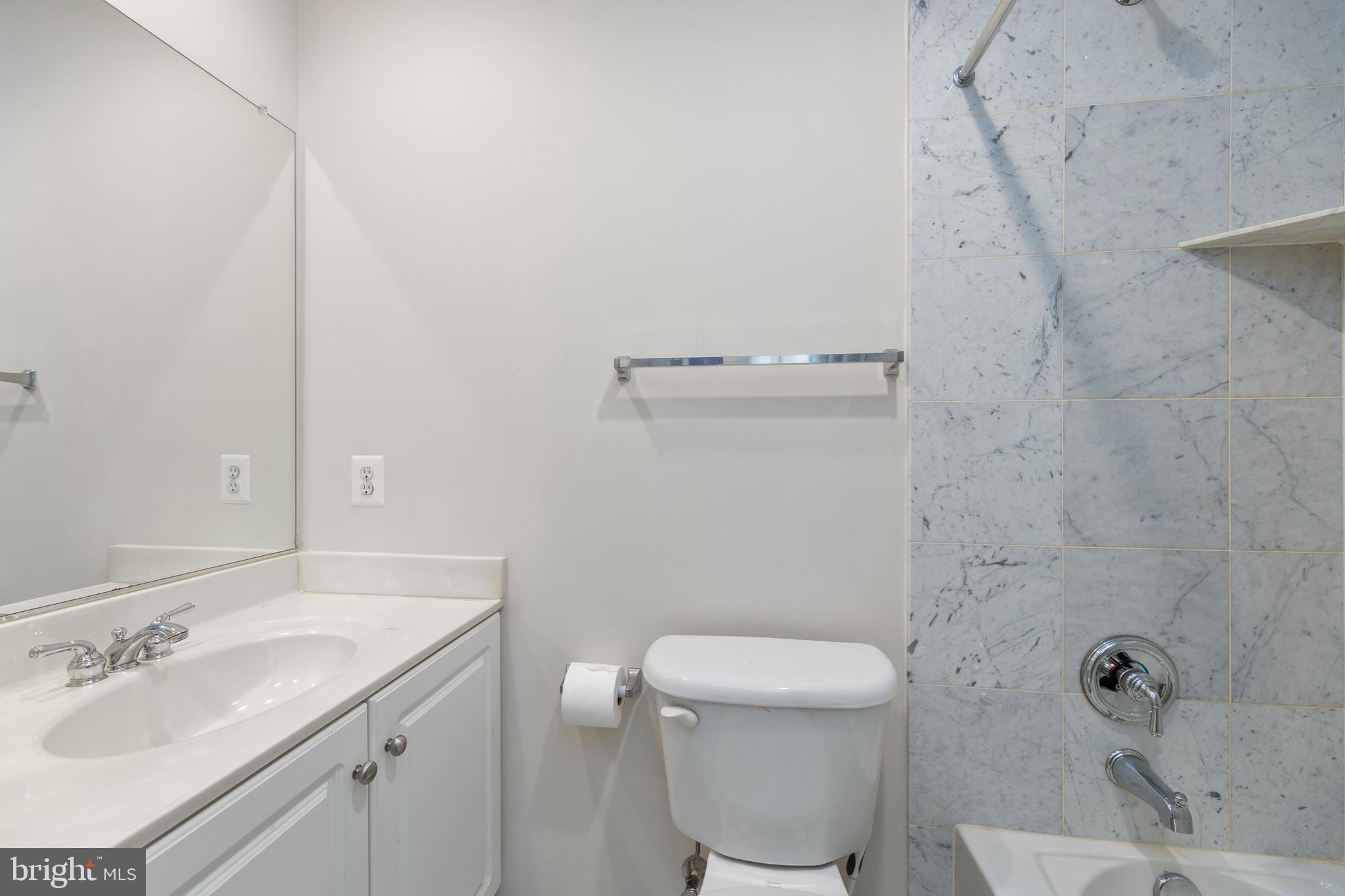 800 Capitol Square Place Southwest Washington, DC 20024 - Photo 29 of 52 a bathroom with a sink a toilet and shower