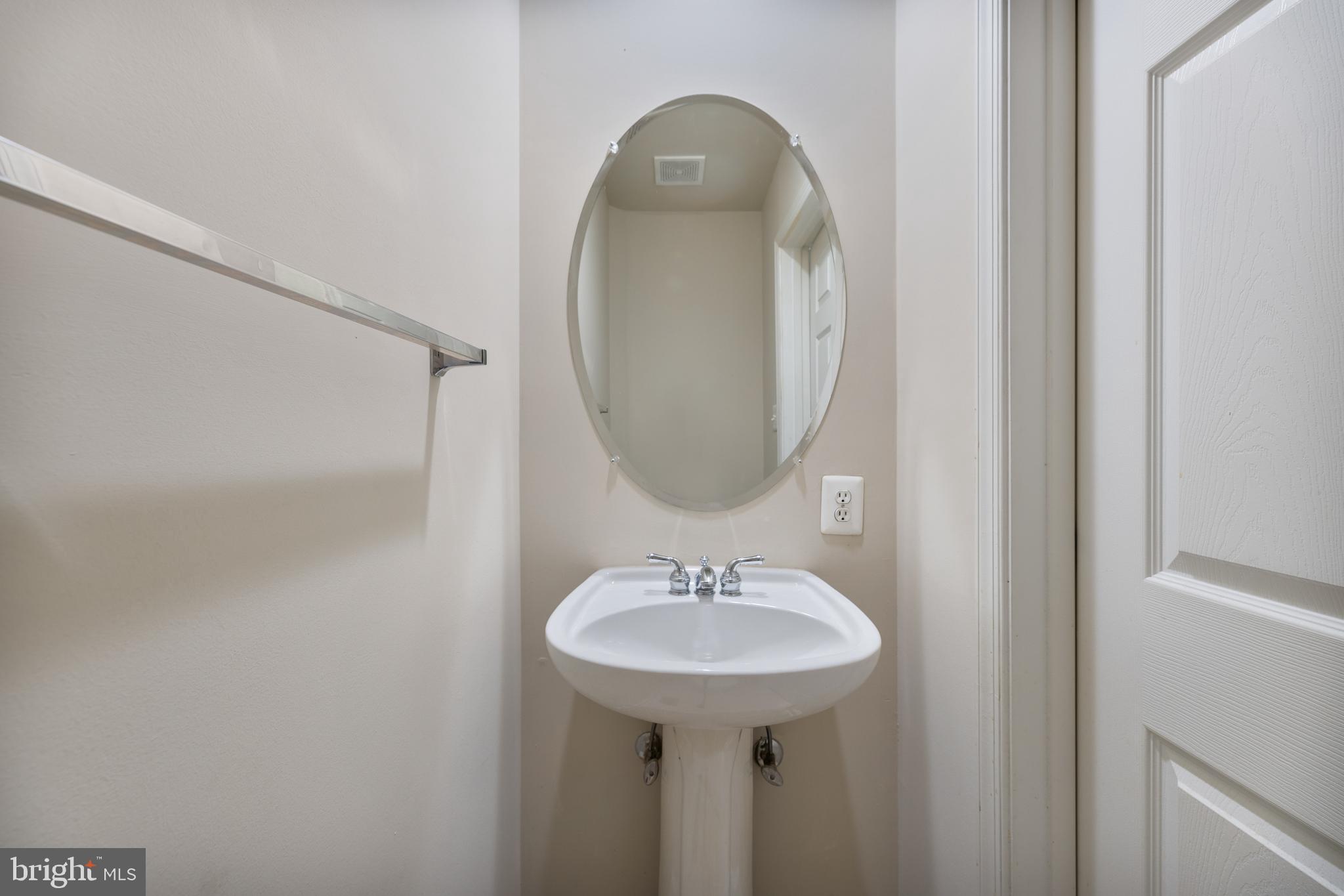 800 Capitol Square Place Southwest Washington, DC 20024 - Photo 30 of 52 a bathroom with a sink and a mirror