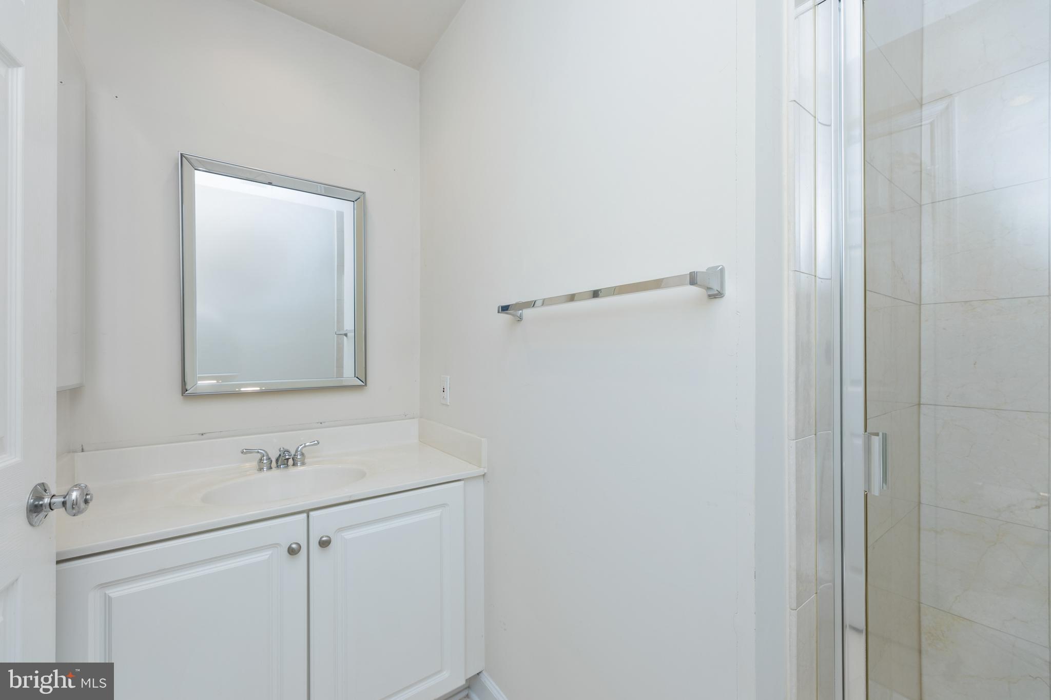 800 Capitol Square Place Southwest Washington, DC 20024 - Photo 31 of 52 a bathroom with a sink and a mirror