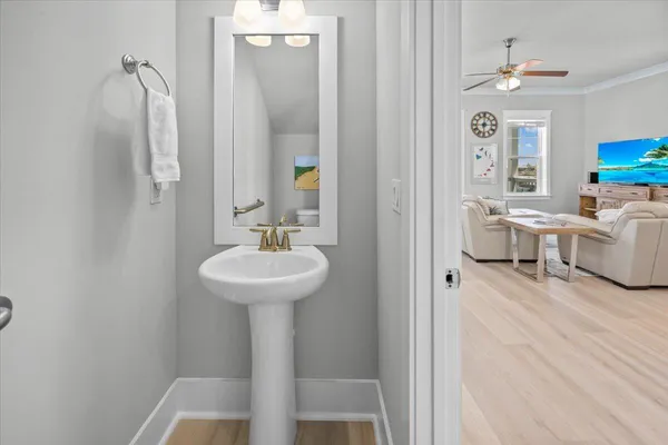 a kitchen with stainless steel appliances granite countertop a refrigerator a oven a sink and a refrigerator