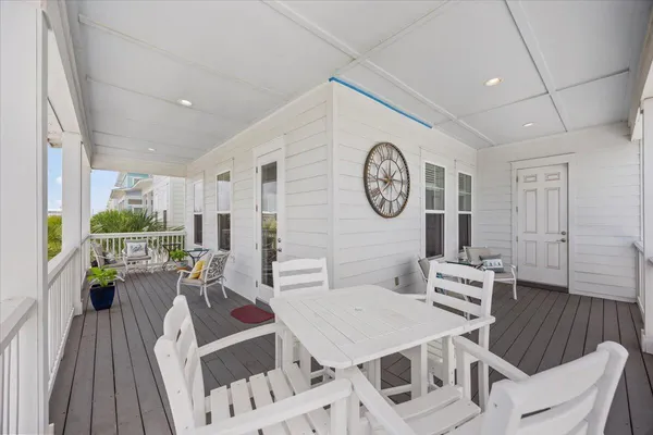 a view of a balcony with an ocean view