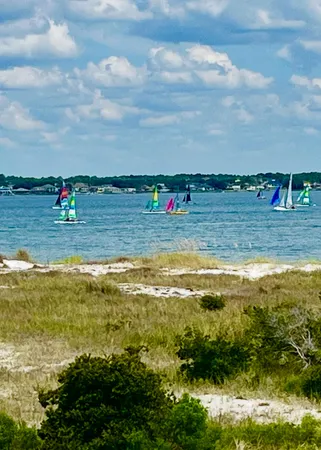 a view of a lake with a sitting area