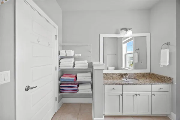 a view of a balcony with wooden floor and city view