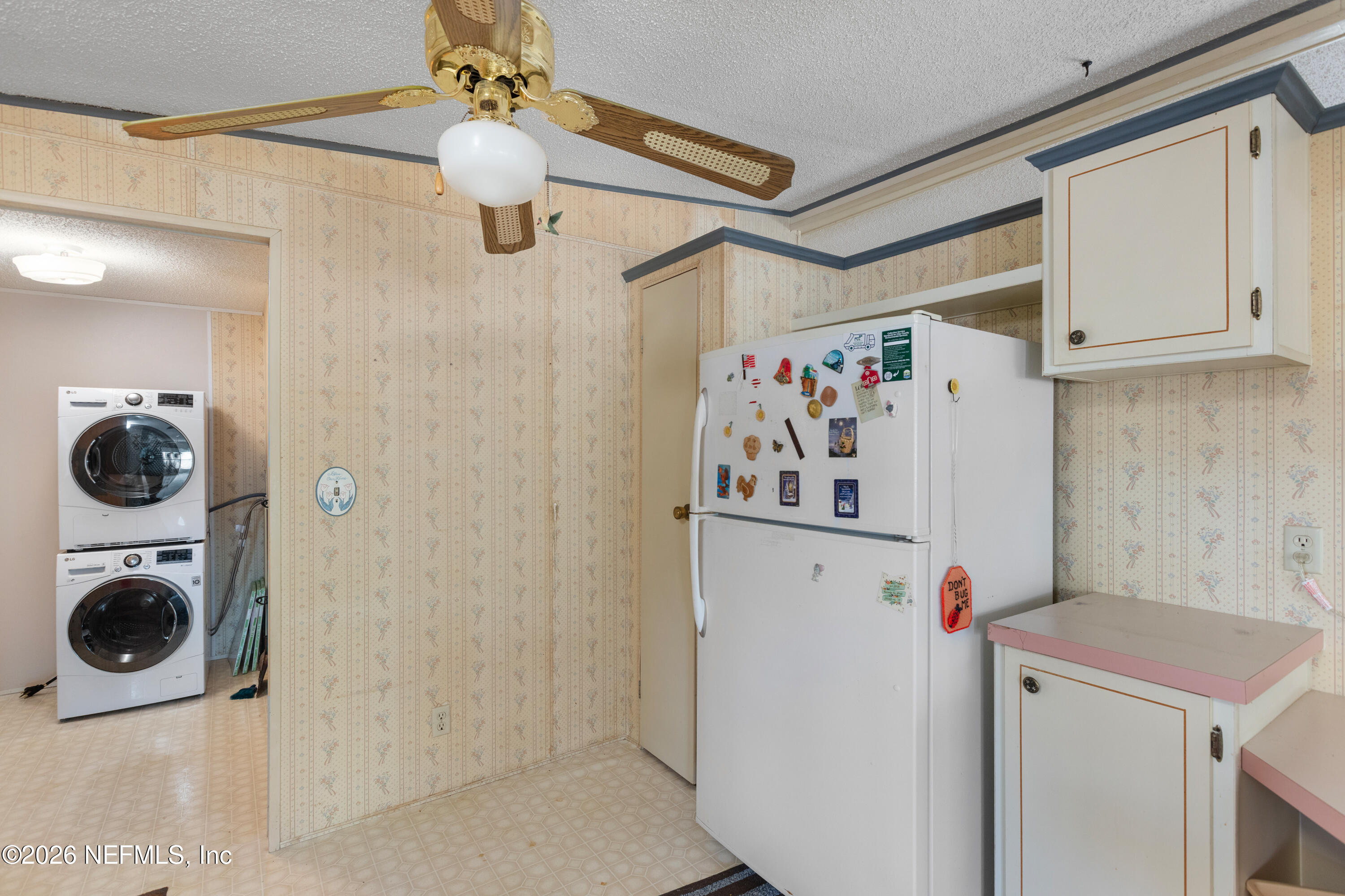 6950 Deer Springs Road Keystone Heights, FL 32656 - Photo 12 of 46 a utility room with dryer and washer