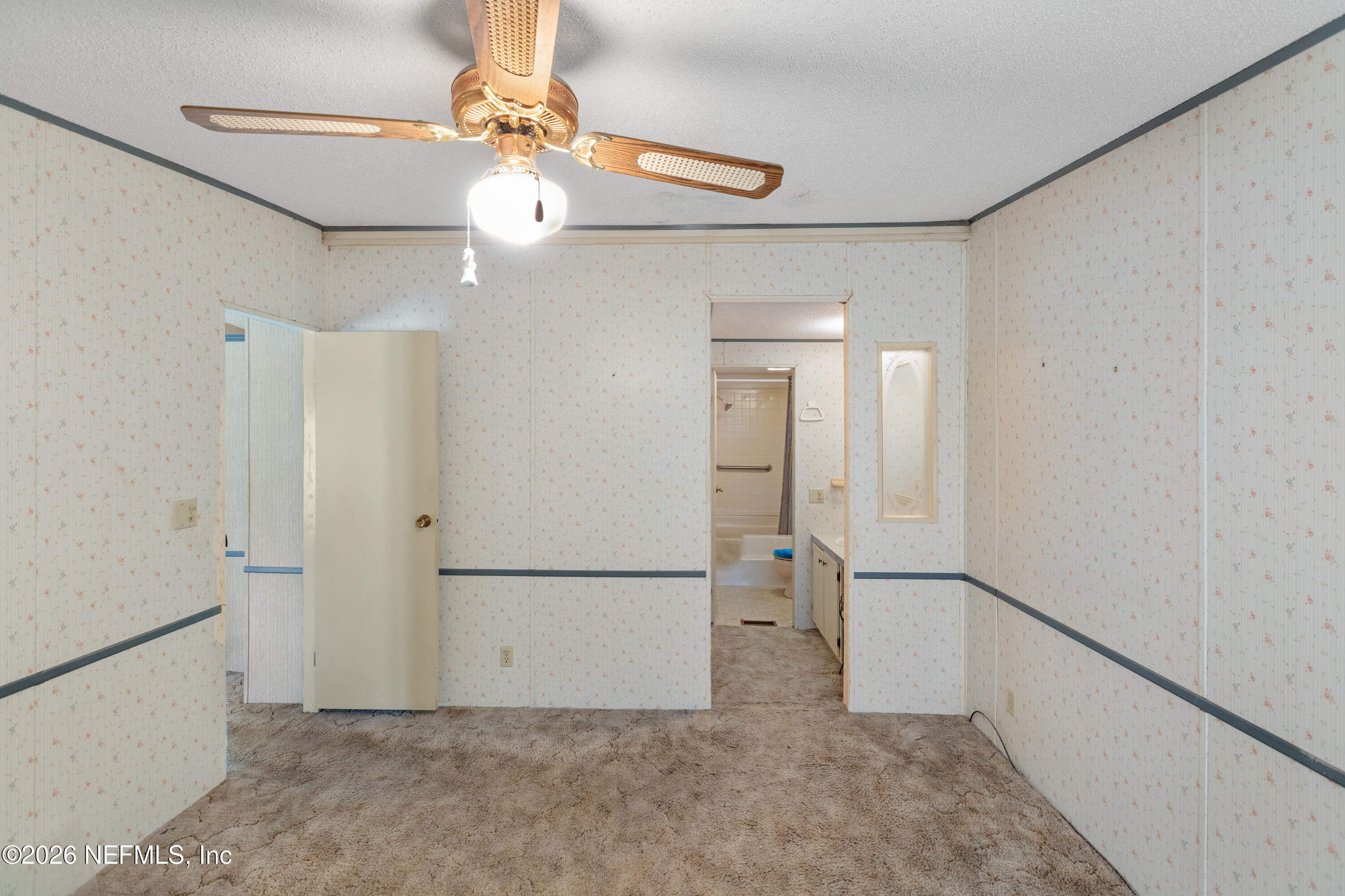 6950 Deer Springs Road Keystone Heights, FL 32656 - Photo 19 of 46 a view of a room with an empty space