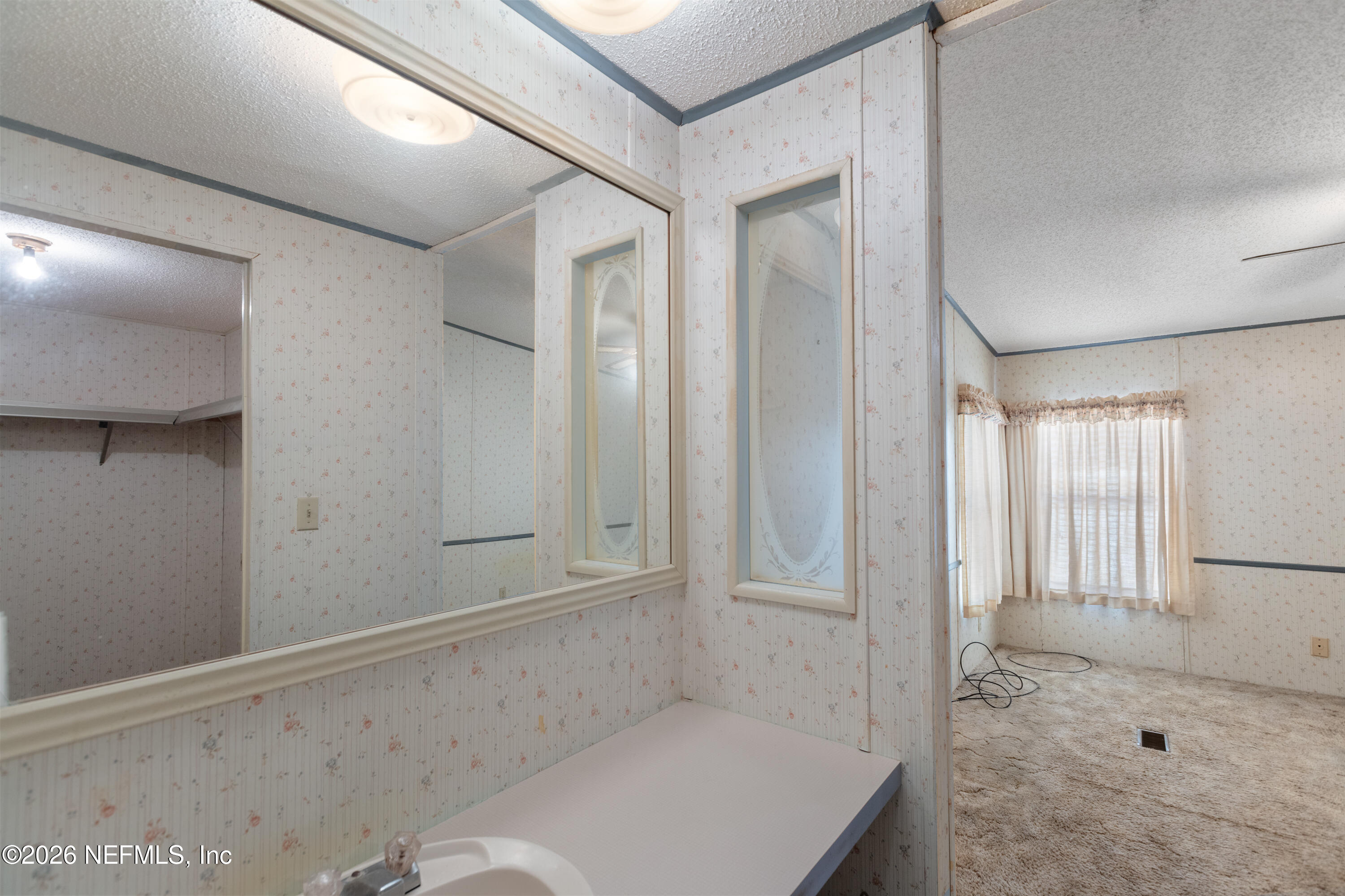 6950 Deer Springs Road Keystone Heights, FL 32656 - Photo 23 of 46 a bathroom with a tub and shower