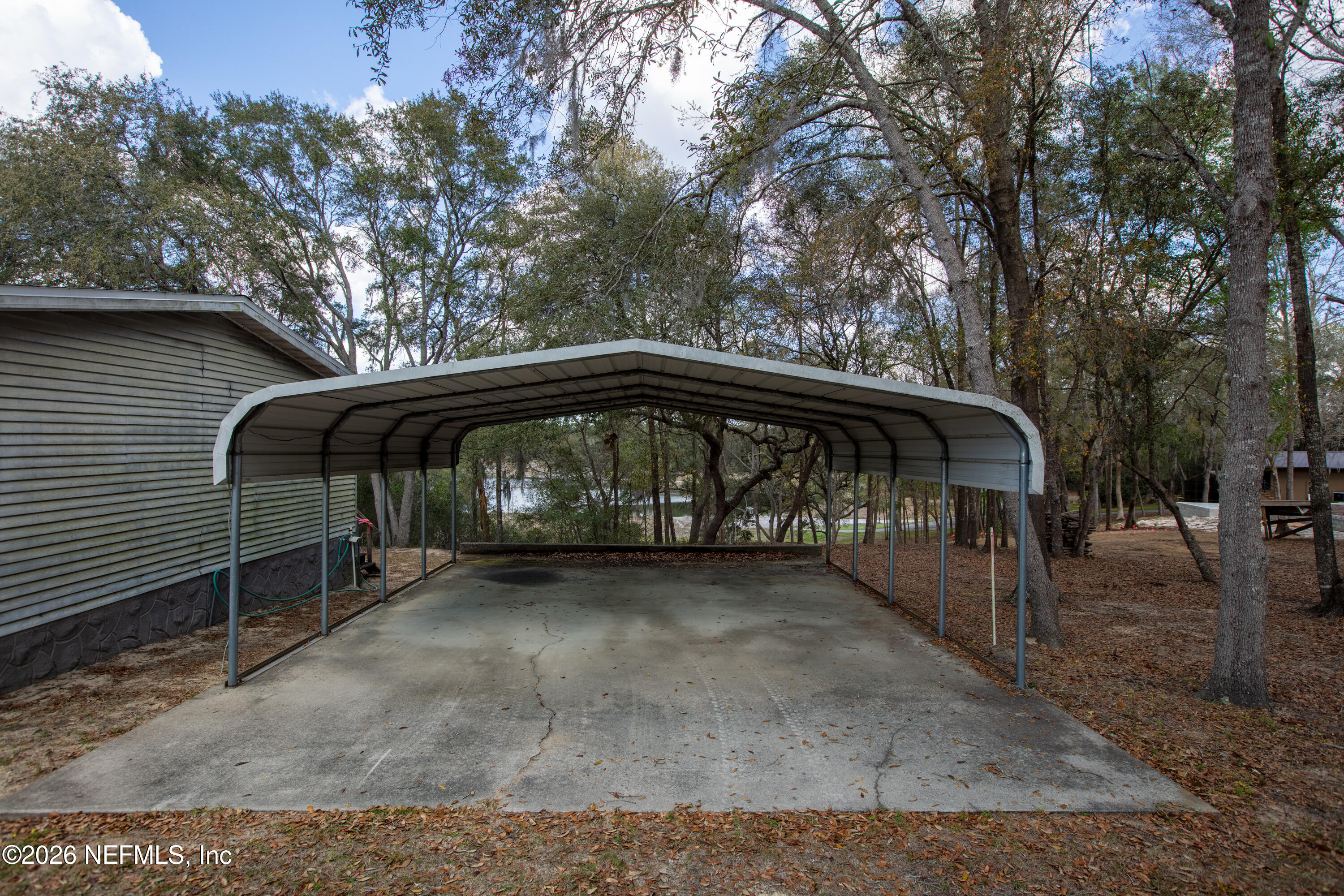 6950 Deer Springs Road Keystone Heights, FL 32656 - Photo 36 of 46 a view of a house with a yard