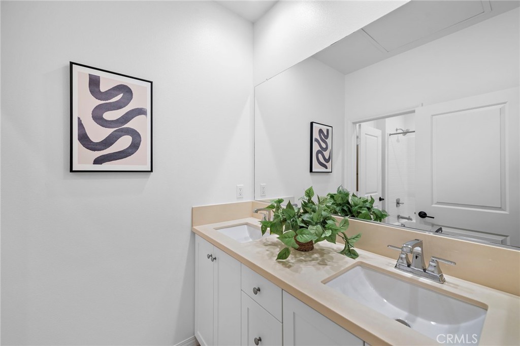 111 Henson Irvine, CA 92620 - Photo 23 of 24 a bathroom with a sink and a mirror