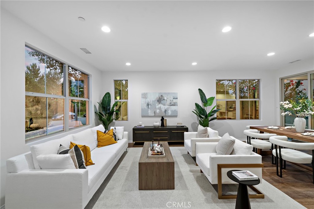 111 Henson Irvine, CA 92620 - Photo 4 of 24 a living room with furniture and a large window