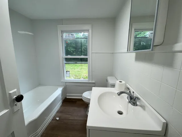 a bathroom with a sink and a bathtub