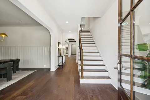 a view of entryway with wooden floor
