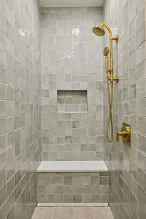 a kitchen with cabinets appliances a sink and a window