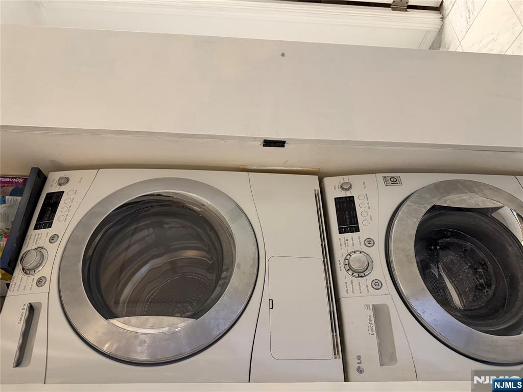 402 Williams Court, Unit U402 Edgewater, NJ 07020 - Photo 7 of 7 a close up view of a washer and dryer