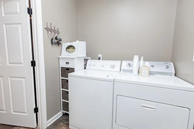 a utility room with dryer and washer