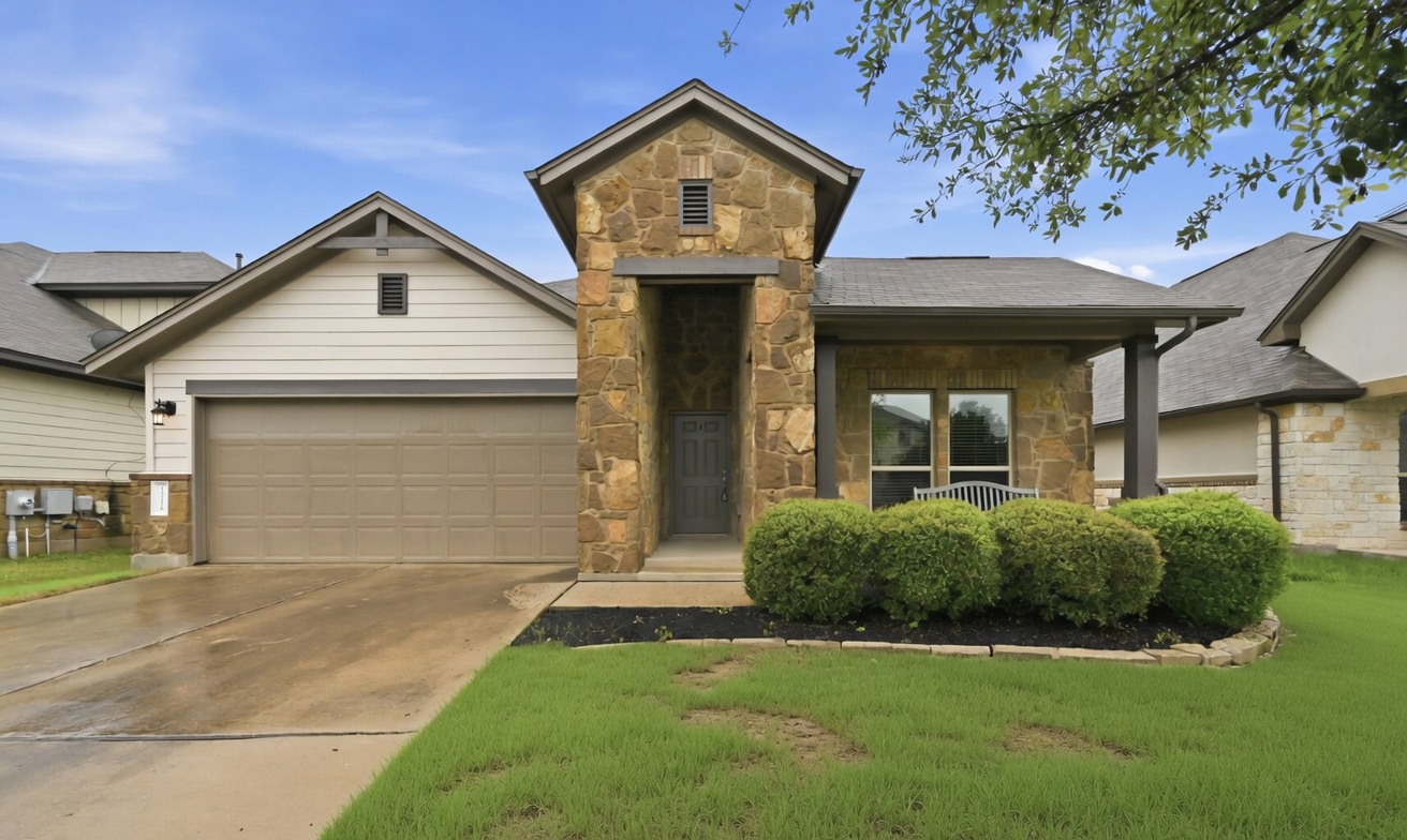 13116 Alans Way Manchaca, TX 78652 - Photo 1 of 25 Stone and siding exterior with a covered entry