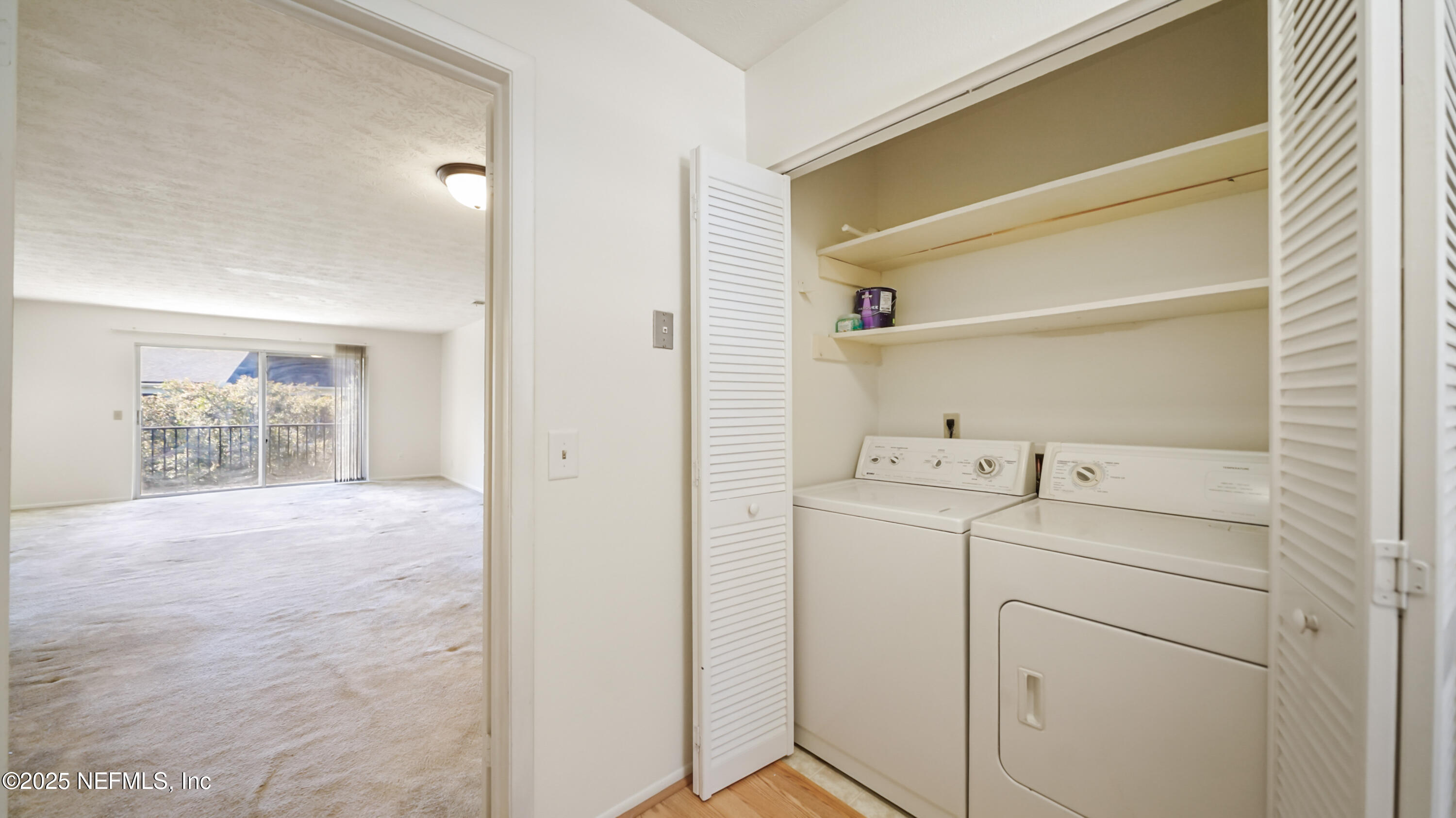 4915 Baymeadows Road, Unit 7H Jacksonville, FL 32217 - Photo 13 of 33 a utility room with dryer and washer
