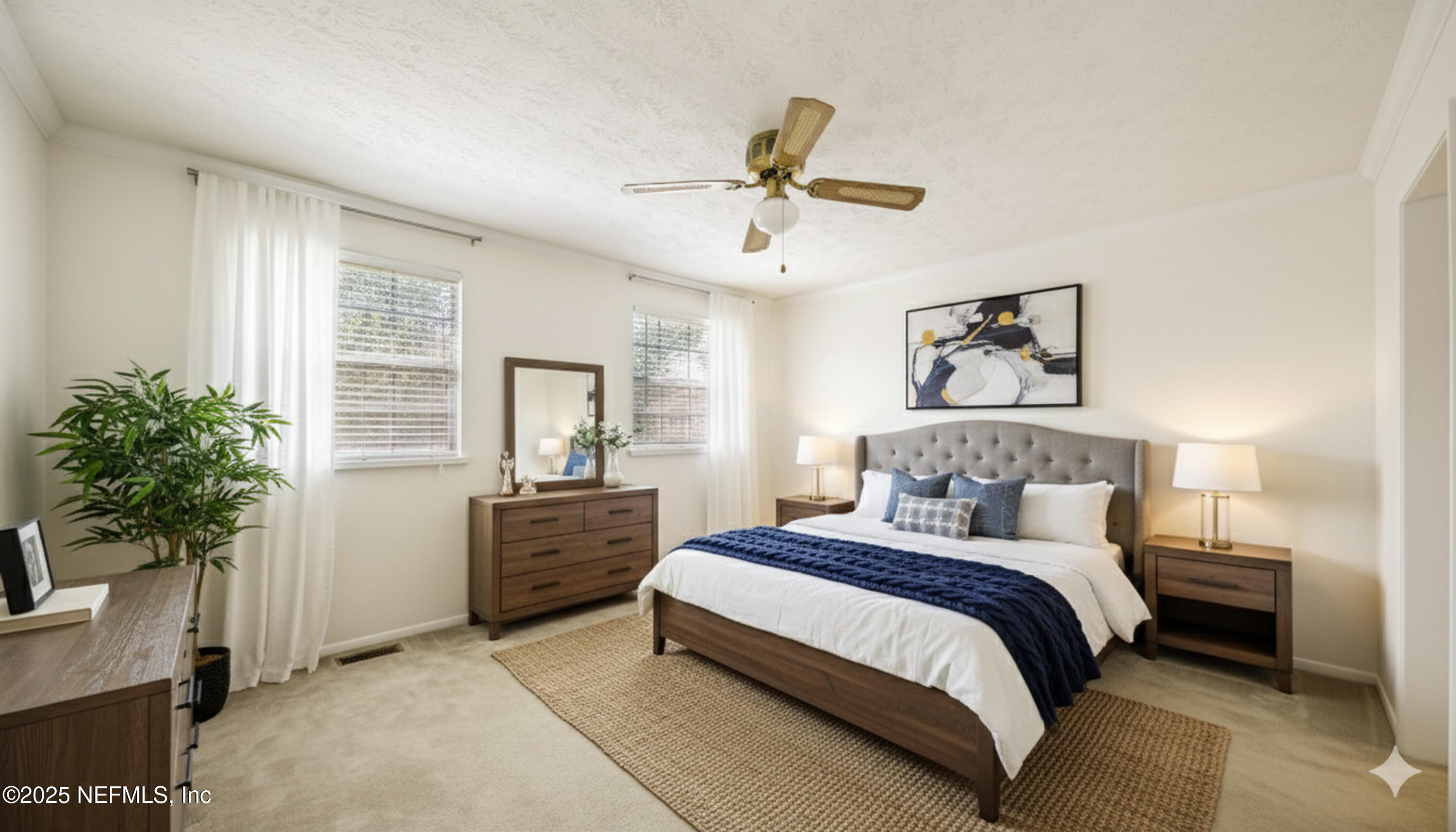 4915 Baymeadows Road, Unit 7H Jacksonville, FL 32217 - Photo 18 of 33 a bedroom with a bed and a potted plant