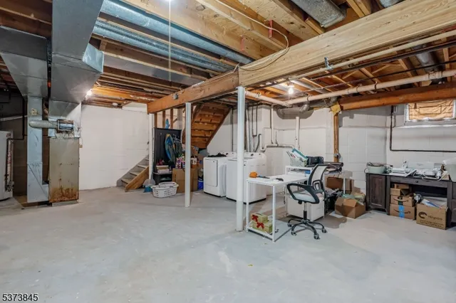 a view of a storage room with utility area