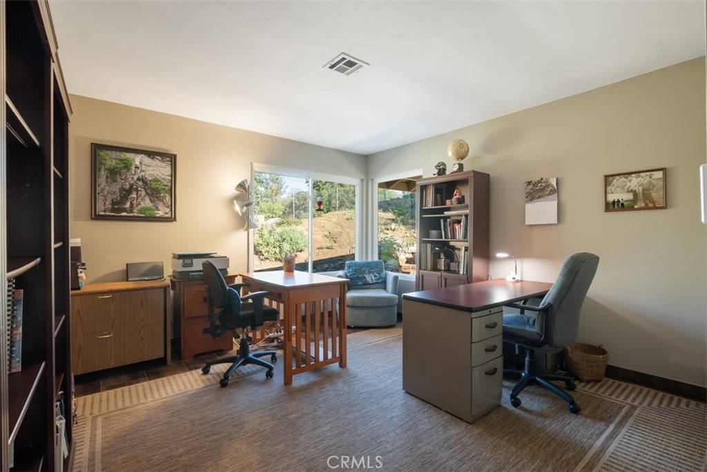 1106 Big Oak Ranch Road Fallbrook, CA 92028 - Photo 19 of 33 a view of a workspace with furniture and a window
