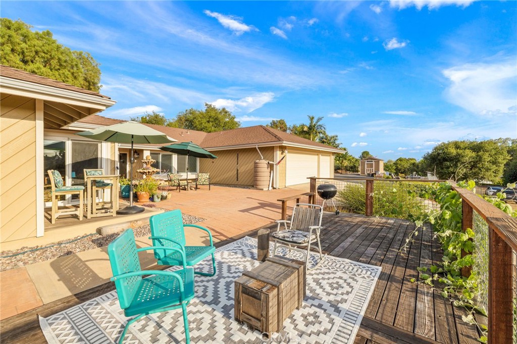 1106 Big Oak Ranch Road Fallbrook, CA 92028 - Photo 2 of 33 a view of a house with backyard and sitting area