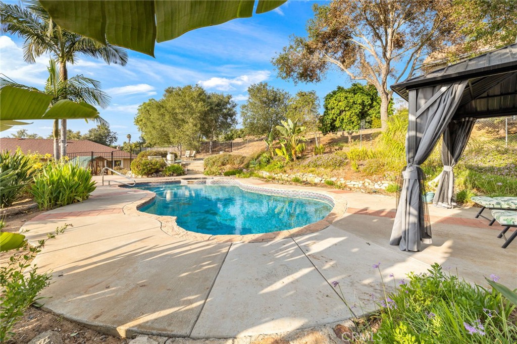 1106 Big Oak Ranch Road Fallbrook, CA 92028 - Photo 29 of 33 a view of a swimming pool with a patio