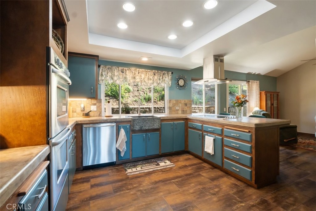 1106 Big Oak Ranch Road Fallbrook, CA 92028 - Photo 10 of 33 a large kitchen with kitchen island granite countertop a large window