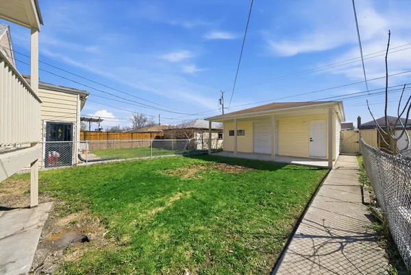 $415,000 | 6535 South Kolin Avenue, Chicago, IL 60629