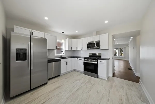$415,000 | 6535 South Kolin Avenue, Chicago, IL 60629
