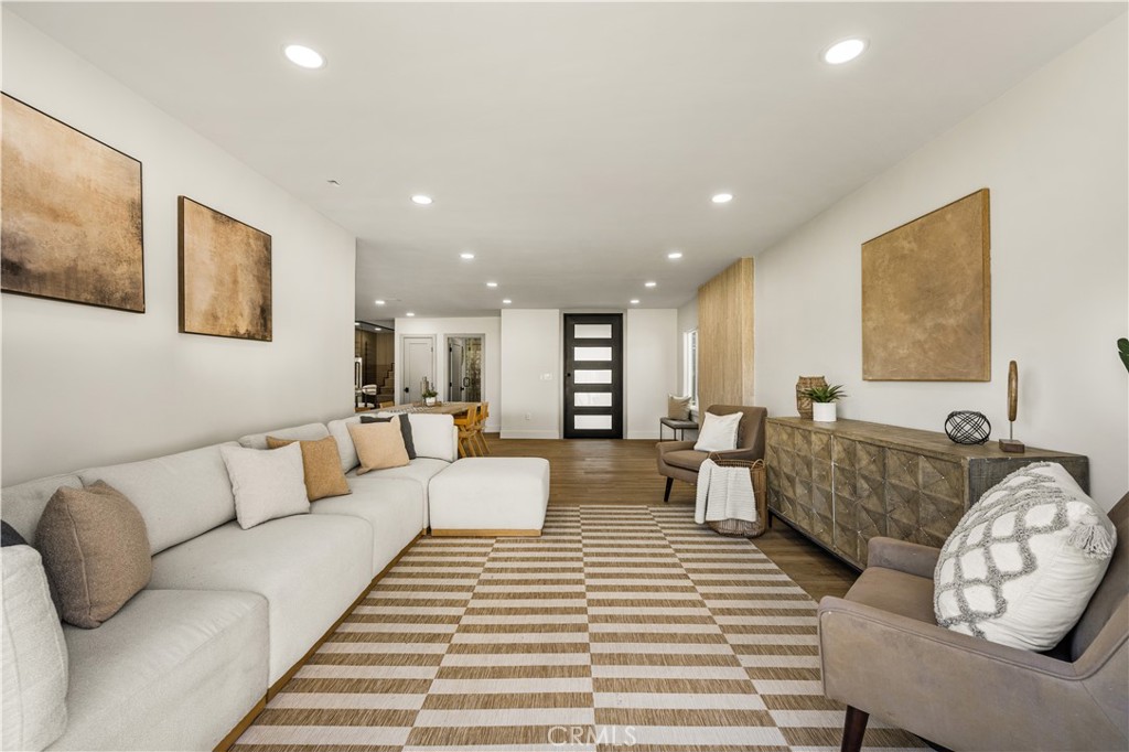 2440 Ostrom Avenue Long Beach, CA 90815 - Photo 18 of 50 a living room with furniture and a couch