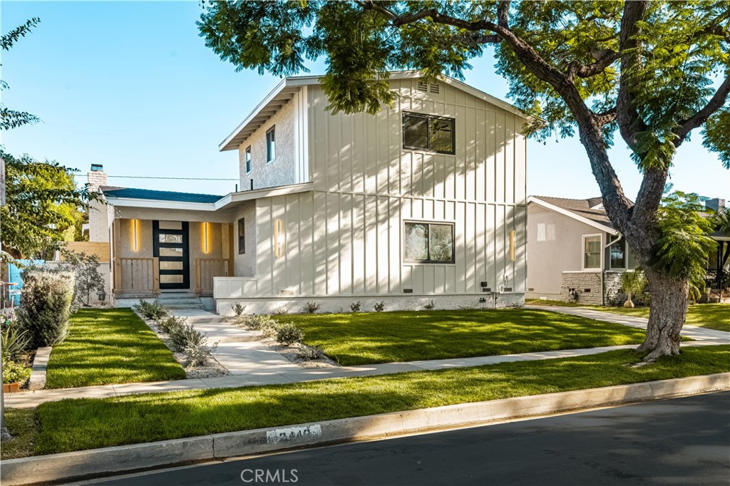 2440 Ostrom Avenue Long Beach, CA 90815 - Photo 2 of 50 a view of a house with a swimming pool