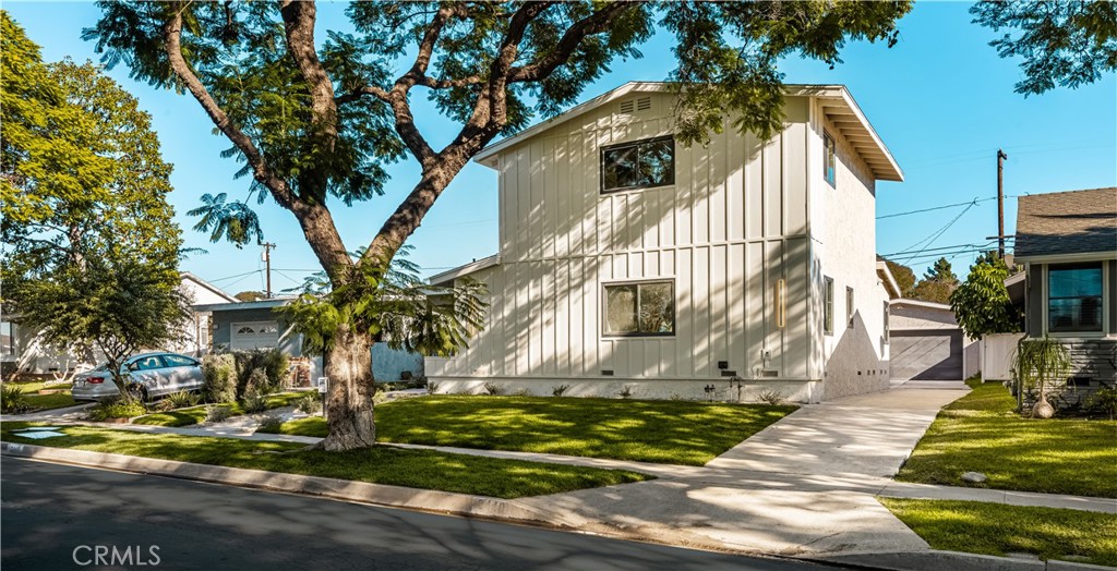 2440 Ostrom Avenue Long Beach, CA 90815 - Photo 3 of 50 a view of a house with a yard