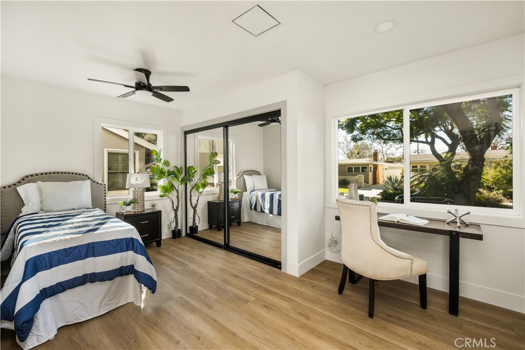 2440 Ostrom Avenue Long Beach, CA 90815 - Photo 34 of 50 a bedroom with a bed and a table